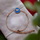 Golden Flexible Bracelet with Sky Blue Ceramic Stone & Zircon Butterfly