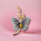 Radiant Flutter Butterfly Brooch in Gold Plating